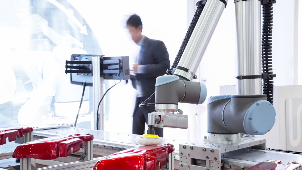 How do people control robotic arms?